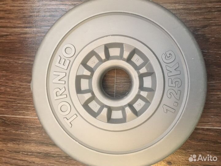 Диск пластиковый для штанги и гантелей Torneo