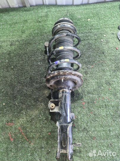 Стойка подвески передняя левая Kia Rio хетчбек