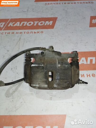 Суппорт тормозной передний правый Nissan X-Trail