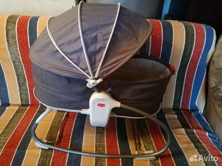 Люльку баунсер tiny love