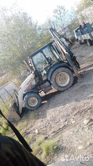 Услуги экскаватора погрузчика с гидромолотом