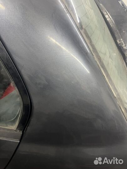 Крыло заднее левое lancer 9