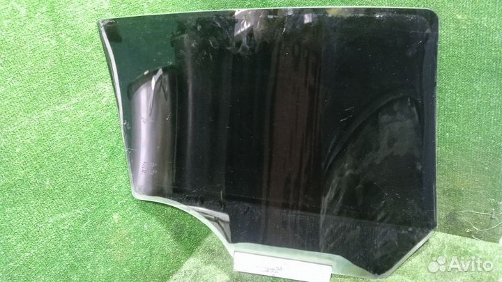 Стекло двери задней левой Opel Astra