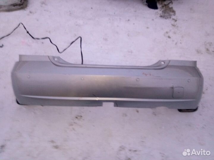 Nissan Almera N16 Бампер задний хэтчбек (RES)