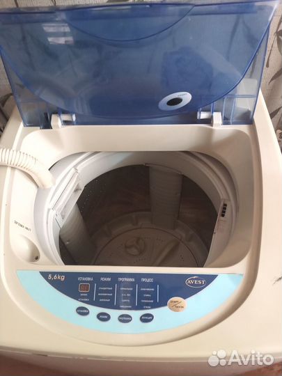 Стиральная машина с вертикальной загрузкой