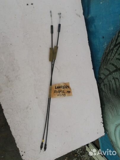 Тросик замка двери Mitsubishi Lancer 1.3 мт 2005 с