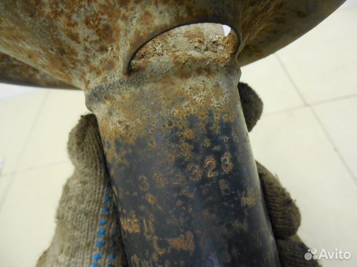 Амортизатор передний левый Almera Tino 2000-2006