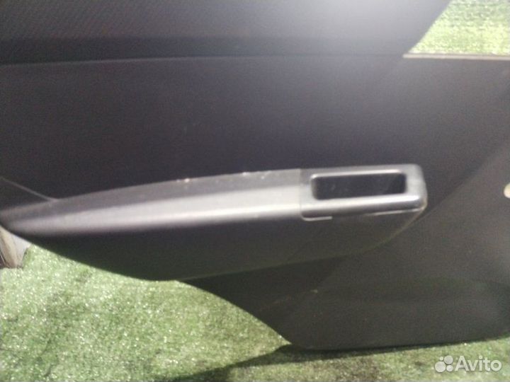 Обшивка боковой двери задняя левая Chevrolet Aveo
