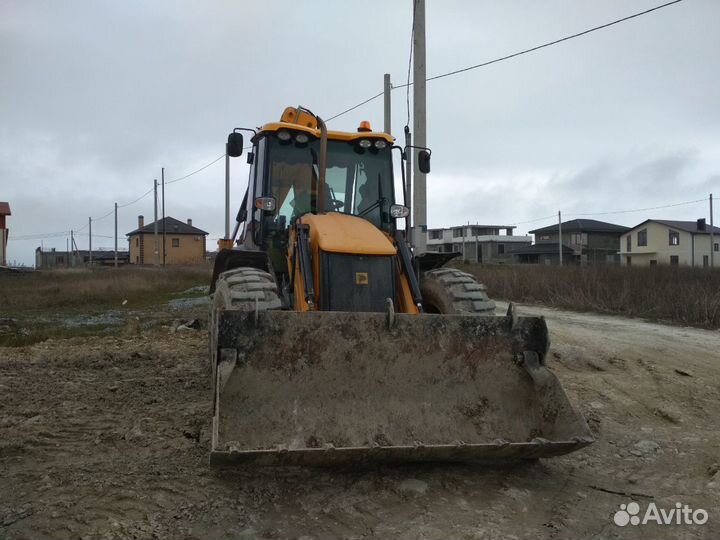 Услуги экскаватора погрузчика