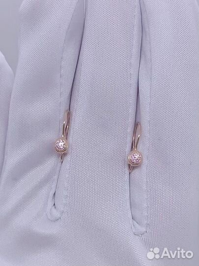 Золотые серьги с камнем