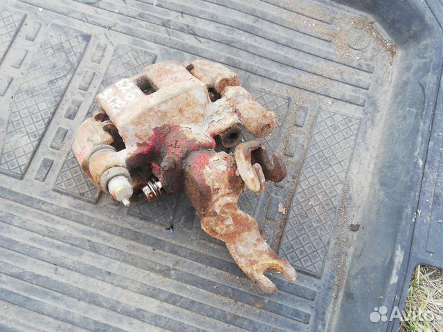 Суппорт задний Мазда 626 GE