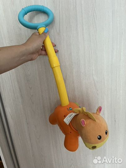 Игрушка каталка с ручкой
