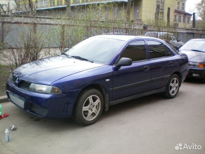 Бампер новый мицубиси каризма carisma
