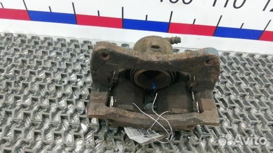 Суппорт тормозной передний левый toyota corolla E1