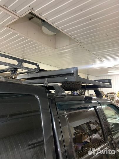 Приспособление для перевозки запасного колеса