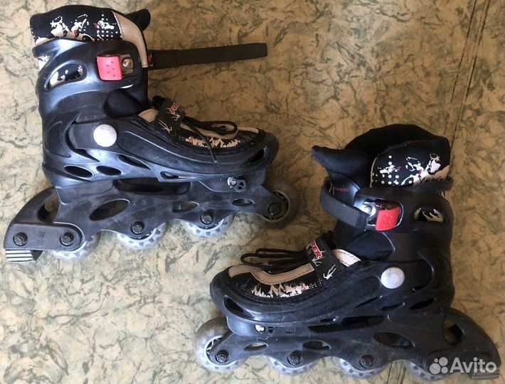 Роликовые коньки