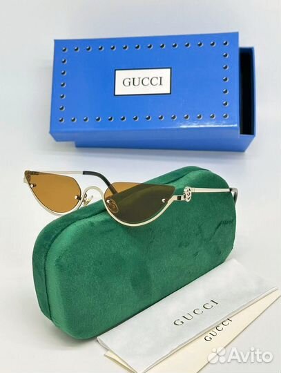 Солнцезащитные очки Gucci