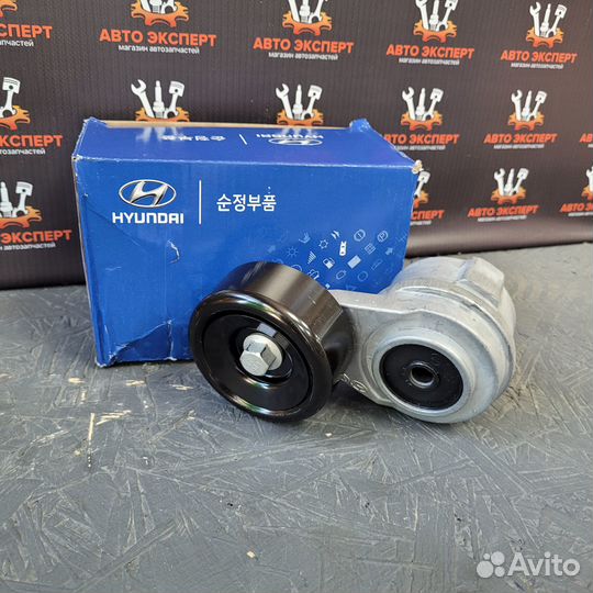 Натяжитель приводного ремня в сборе с роликом