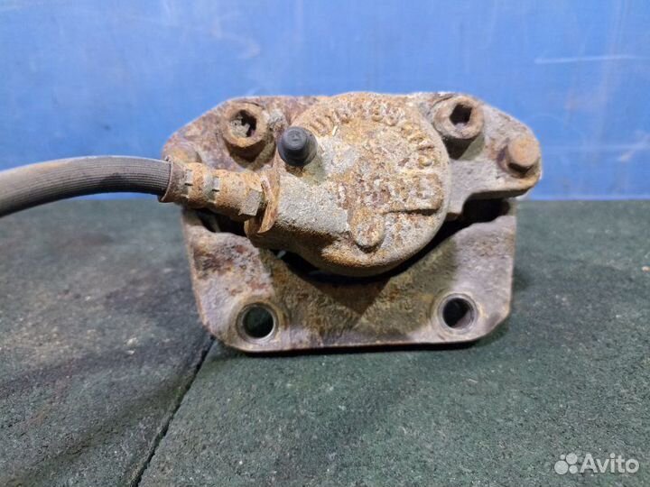 Суппорт тормозной передний левый Renault Logan 1