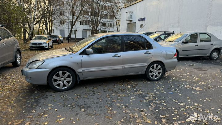 Mitsubishi Lancer 1.6 AT, 2009, 260 000 км