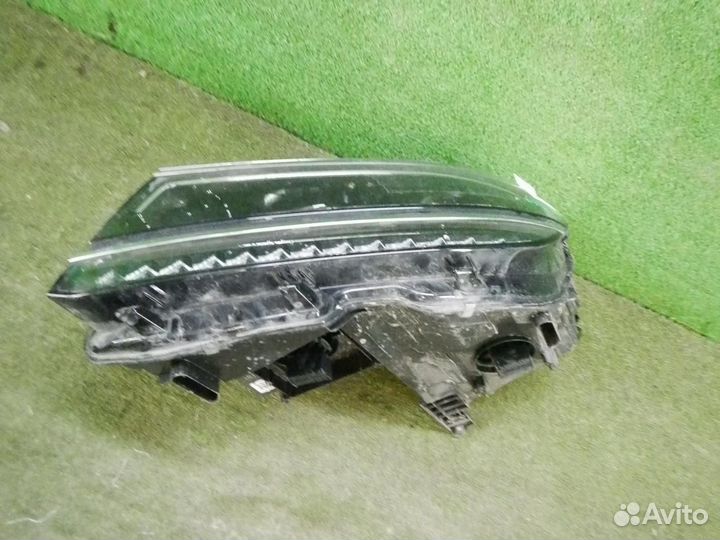 Фара левая Volkswagen Tiguan