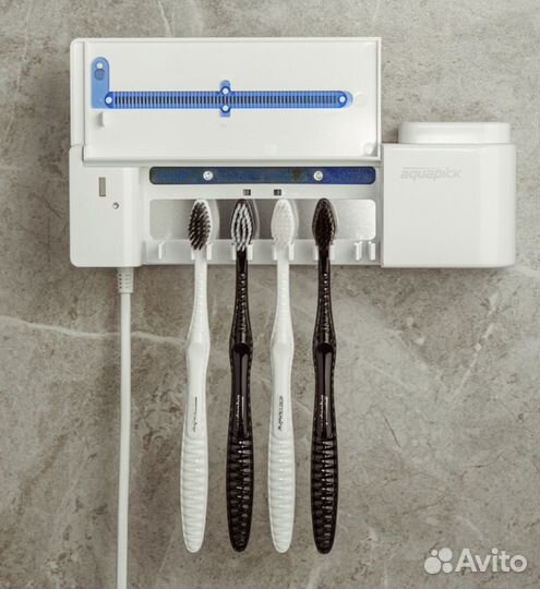 Электрическая зубная щетка