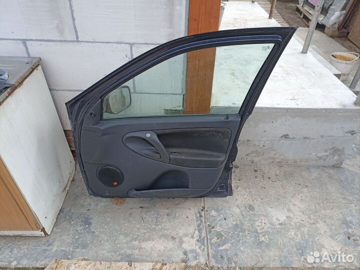 Дверь передняя пассажирская калина
