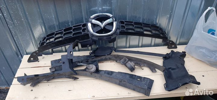 Решётка радиатора с эмблемой Мазда сх7