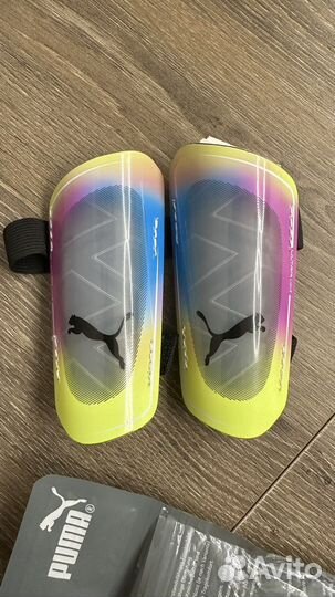 Новые детские футбольные щитки puma