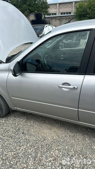 Левая передняя дверь LADA гранта FL