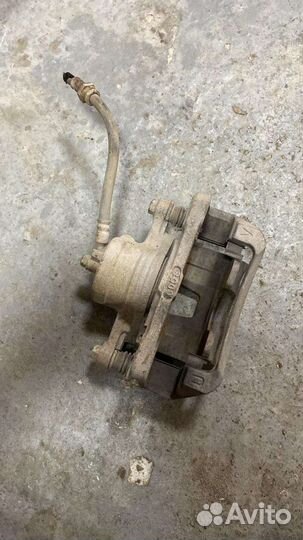 Суппорт тормозной передний правый Chevrolet Lachet