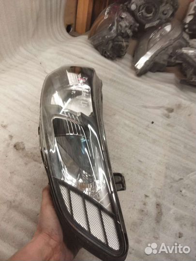 Фара левая Kia Cerato 09-13