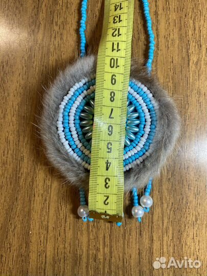 Нагрудное украшение солнышко из бисера