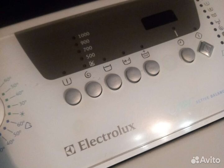 Стиральная машина с вертикальной загрузкой