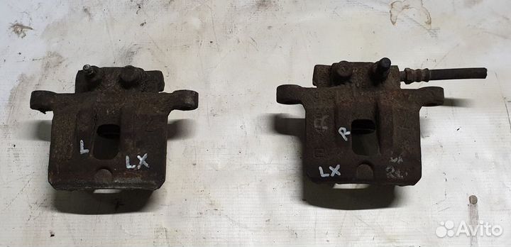 Суппорт задний митцубиси ланцер 10