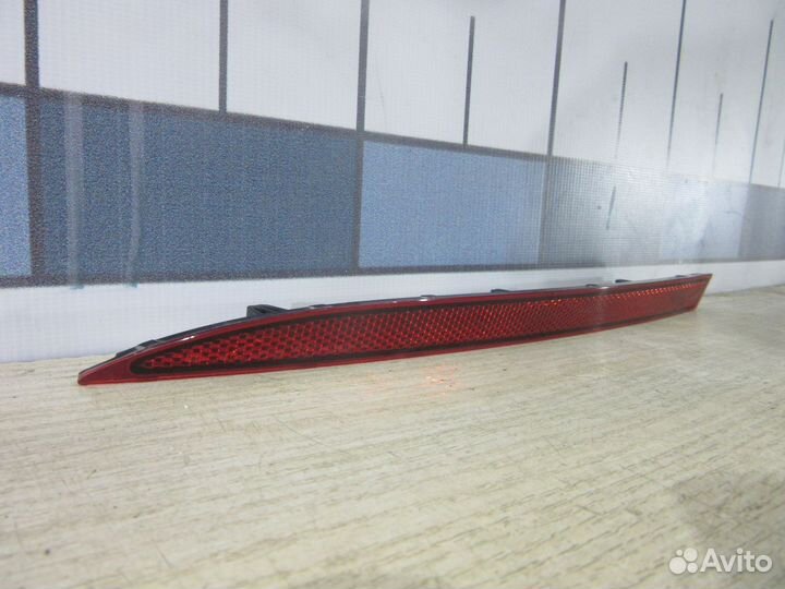 Отражатель в бампер задний левый VW Touareg