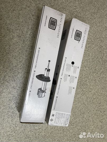 Стойки амортизатора задние лансер 9