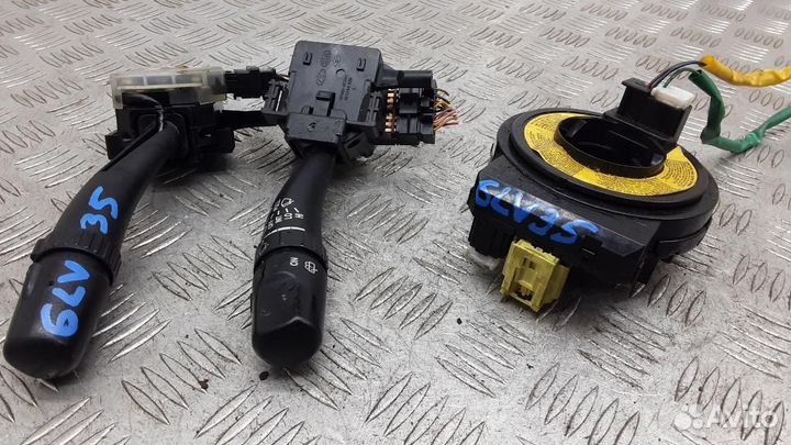 Переключатель поворотов подрулевой Kia Carnival