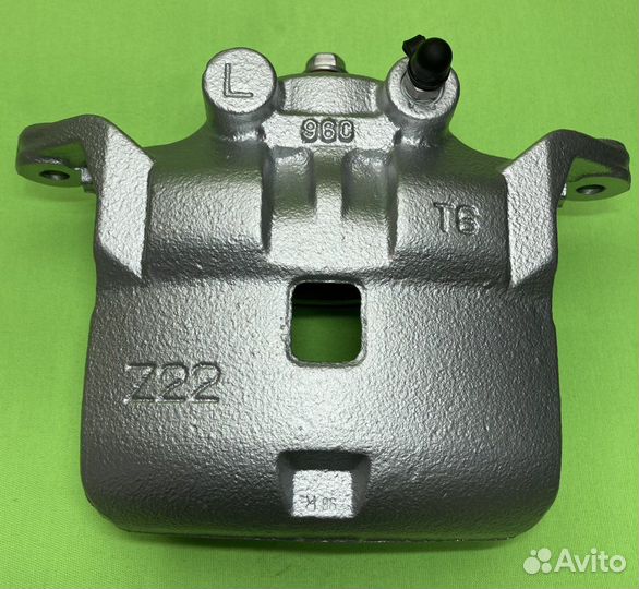 Nissan Cube тормозной суппорт