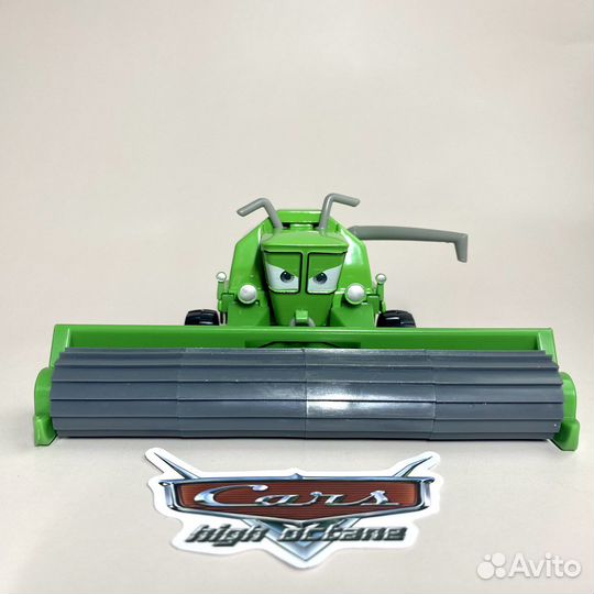 Зеленый комбайн Фрэнк из мульта Тачки