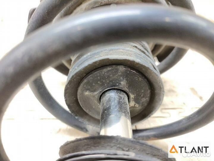 Стойка передняя левая mazda demio