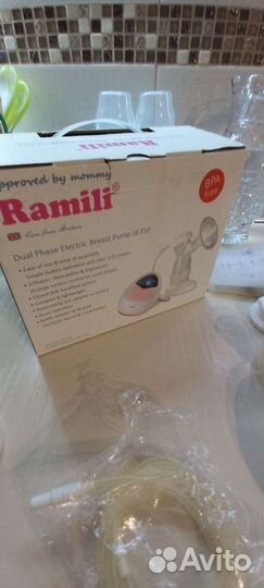 Электрический молокоотсос