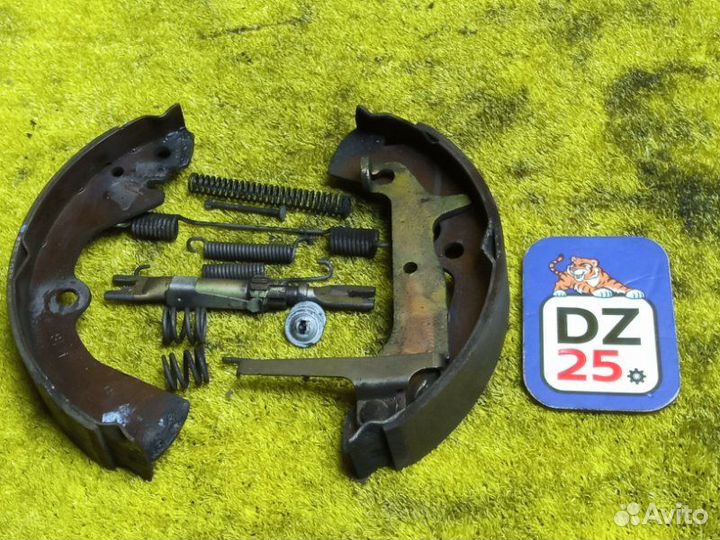 Механизм стояночного тормоза задний левый Nissan