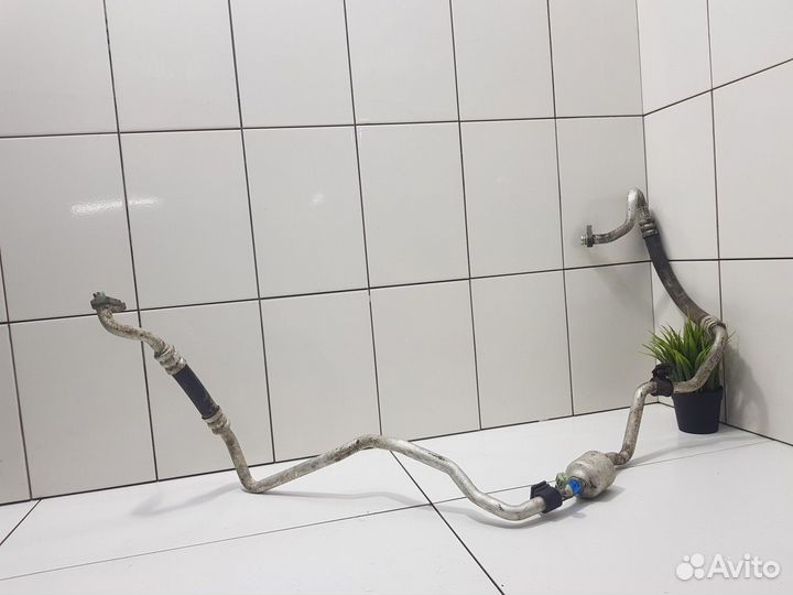 Трубка кондиционера (Hyundai Santa Fe II)