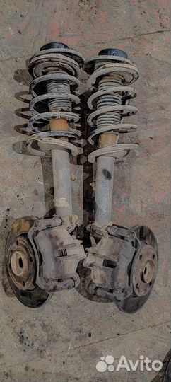 Передние стойки с поворотным кулаком Peugeot 206