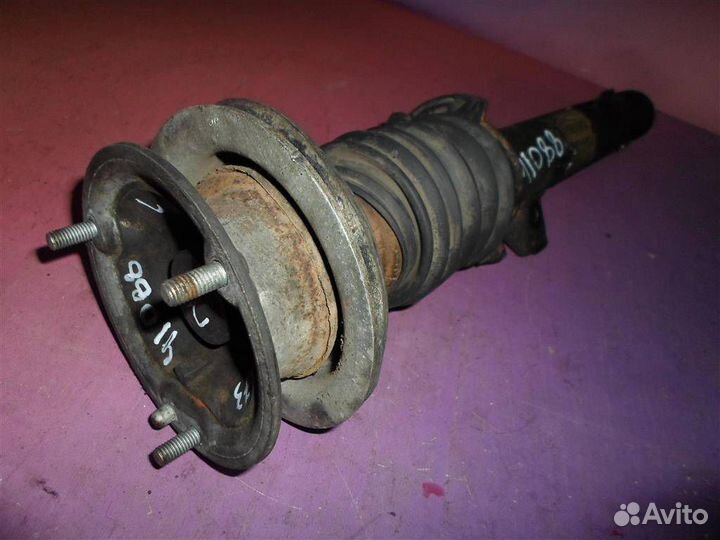 Стойка амортизатора М бмв Е87 Е81 передняя