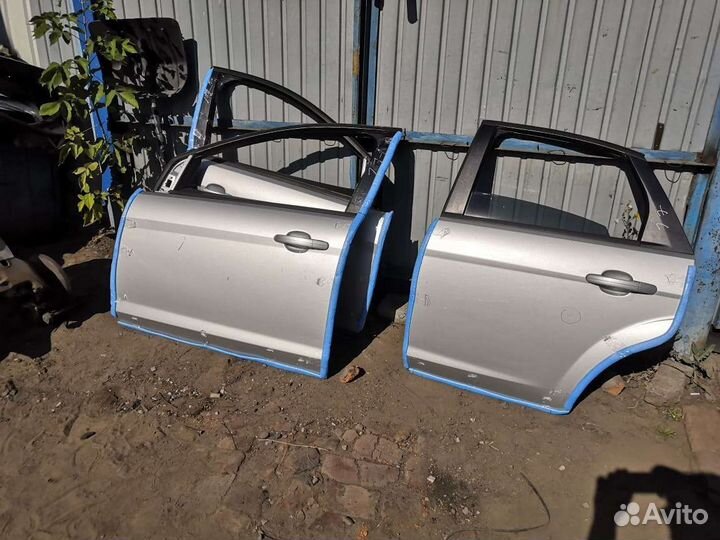 Дверь задняя левая в сборе 08-11г фокус 2