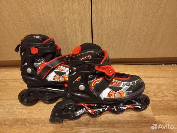 Роликовые коньки