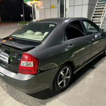 Kia Cerato 2.0 AT, 2004, 198 000 км, с пробегом, цена 279 000 руб.