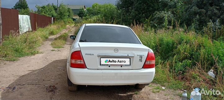 Mazda Familia 1.3 AT, 2002, 180 000 км